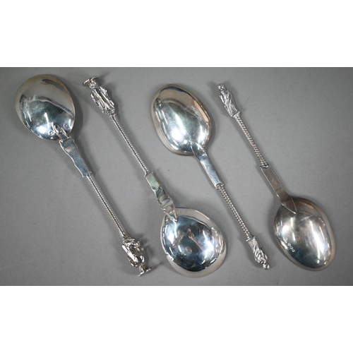 166 - A cased set of two berry spoons with matching sifter ladle, all of Georgian origin, with gilt bowls,... 