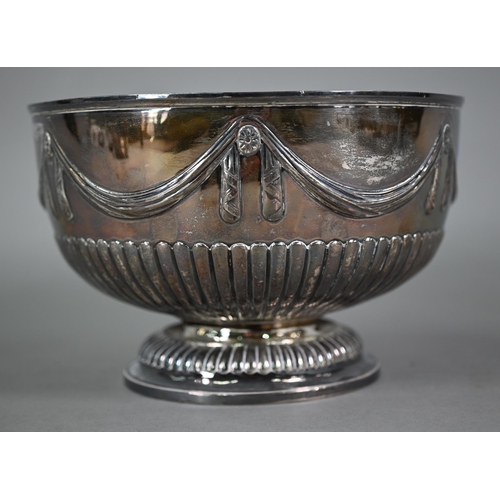 174 - A Victorian silver rose-bowl embossed with ribbon swags and half reeding, on stemmed foot, Charles S... 