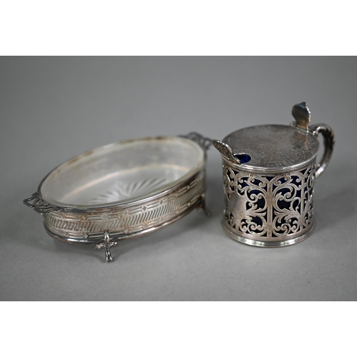 175 - A Victorian pierced silver drum mustard with hinged cover and scroll handle, George Unite, Birmingha... 