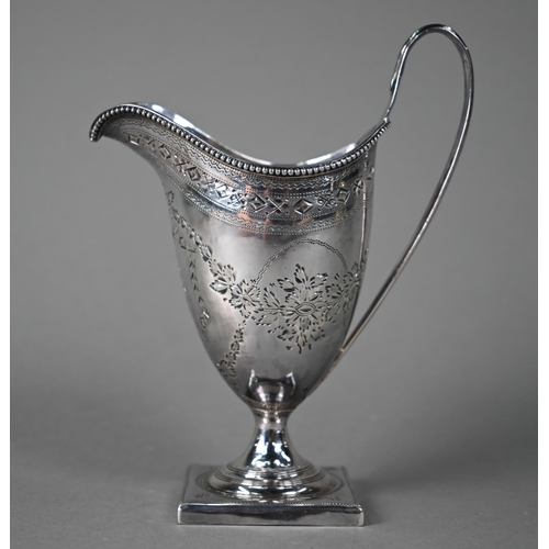 195 - A George III silver urn-shaped cream jug in the Adam manner, with beaded rim, engraved decoration an... 