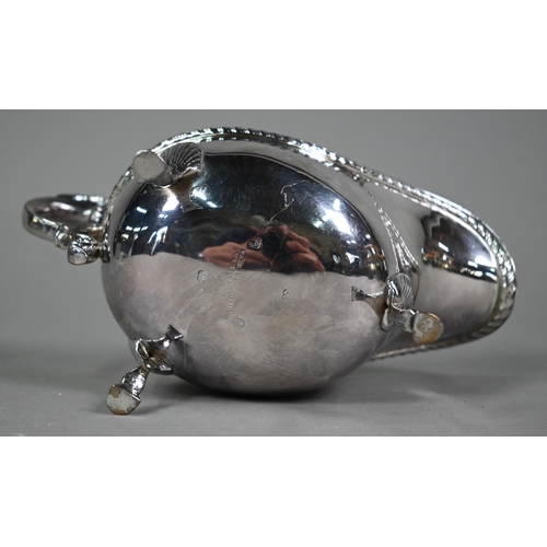 196 - A US market (Tiffany) Irish silver sauce-boat in Georgian taste, with gadrooned rim, scroll handle a... 