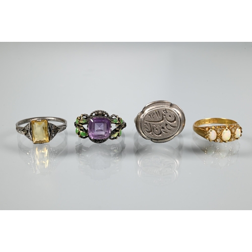 203 - An antique 18ct yellow gold ring set with three graduated opals with rose cut diamonds, size L to/w ... 