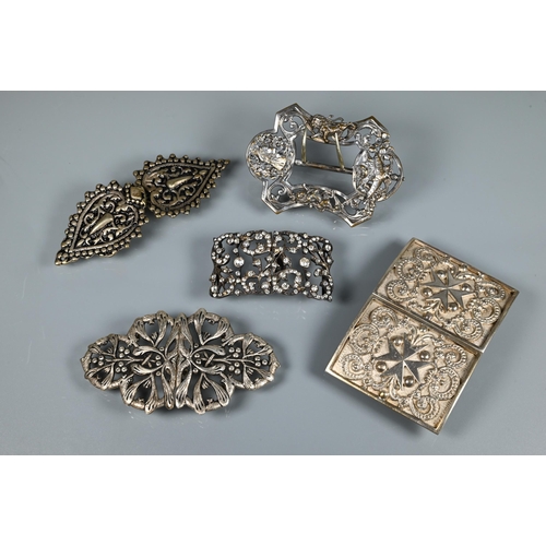 208 - A collection of white metal buckles including single pierced Victorian buckle with two lions rampant... 