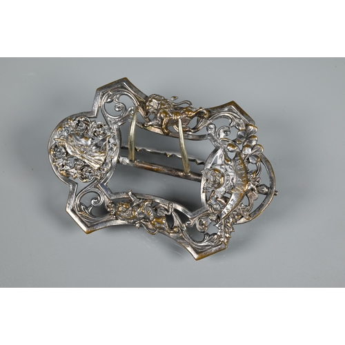 208 - A collection of white metal buckles including single pierced Victorian buckle with two lions rampant... 