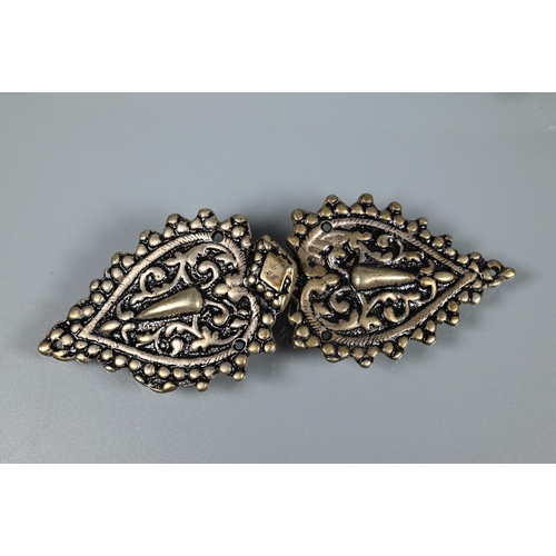 208 - A collection of white metal buckles including single pierced Victorian buckle with two lions rampant... 