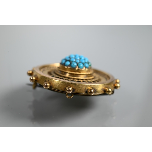 211 - A Victorian target brooch with beaded edge and rope and wirework decoration, the central boss set ov... 