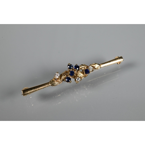 215 - A 9ct yellow gold bar brooch set with sapphires and diamonds in leaf tendril setting, 5 cm long, app... 