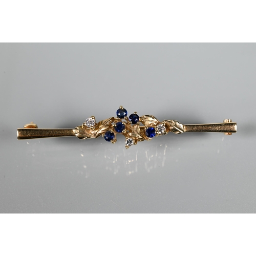 215 - A 9ct yellow gold bar brooch set with sapphires and diamonds in leaf tendril setting, 5 cm long, app... 