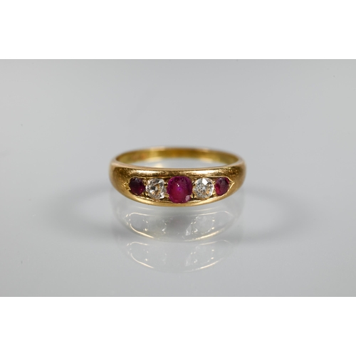 218 - An antique 18ct yellow gold ring set with five graduated alternate set ruby and diamonds, size N, ap... 