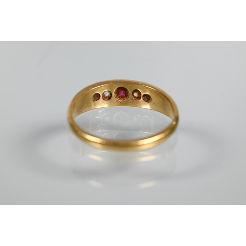 218 - An antique 18ct yellow gold ring set with five graduated alternate set ruby and diamonds, size N, ap... 