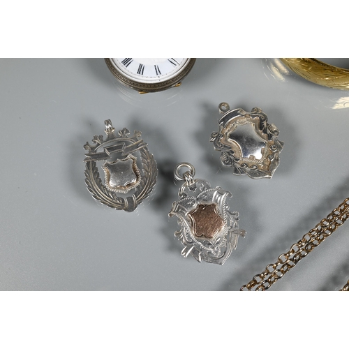 219 - Three silver Victorian shield fobs, a silver-cased pocket watch, silver-gilt belcher chain and gilt ... 