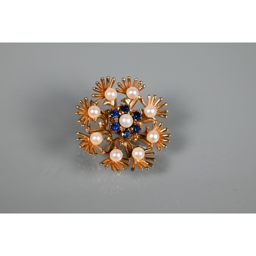 220 - A 9ct yellow gold circular brooch in the form of leaf fronds enclosing seed pearls and with pearl an... 