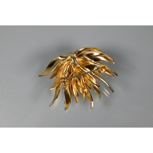 231 - A yellow metal stylised flower brooch set small pearls, stamped 375, approx 7.8g to/w a gilt metal l... 