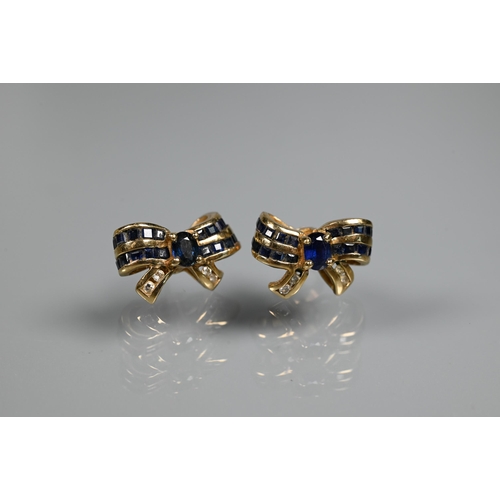 238 - A collection of various 9ct gold earrings including knot studs, bows set with sapphires and diamonds... 