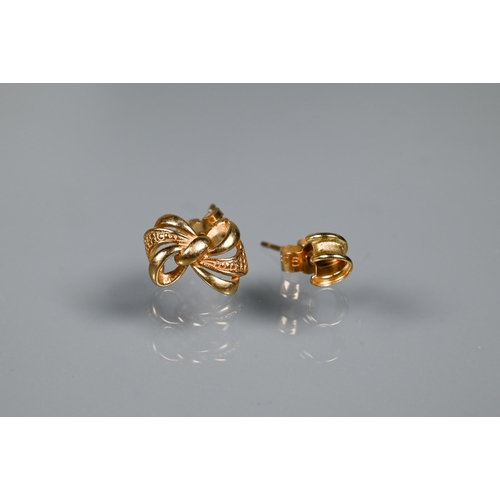 238 - A collection of various 9ct gold earrings including knot studs, bows set with sapphires and diamonds... 