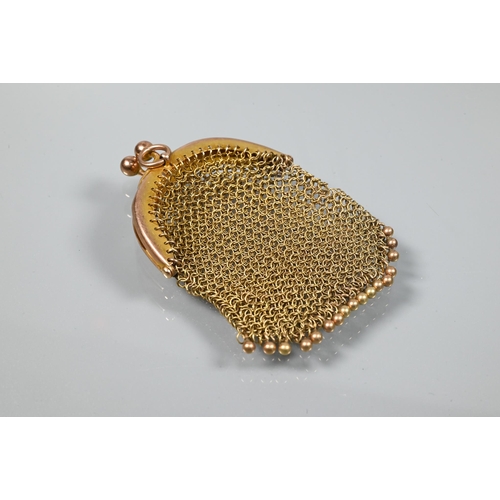 244 - A collection of various old gold items including 9ct and 18ct studs, denture holder, and mesh sovere... 