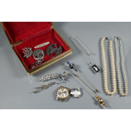 250 - A collection of white metal brooches, two hat pins and two rows of simulated pearls etc