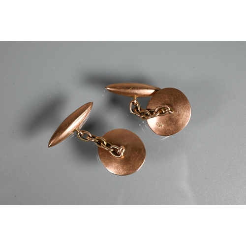 263 - A pair of antique chain-linked cufflinks, set operculum and with torpedo backs