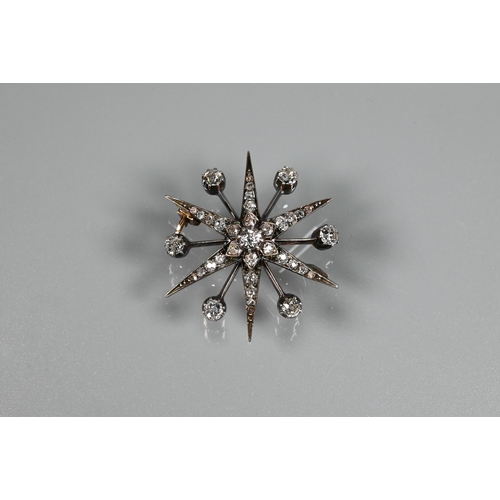 275 - A late Victorian diamond set starburst brooch, set overall with graduated old cut diamonds, yellow a... 