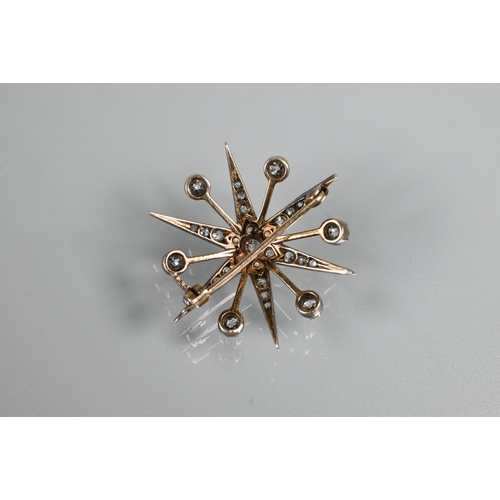 275 - A late Victorian diamond set starburst brooch, set overall with graduated old cut diamonds, yellow a... 