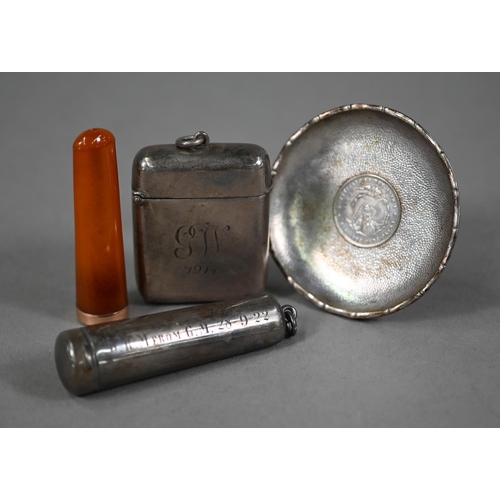 28 - A heavy quality silver vesta case, engraved 'GW 1914', Birmingham 1912, to/w an amber cheroot-holder... 