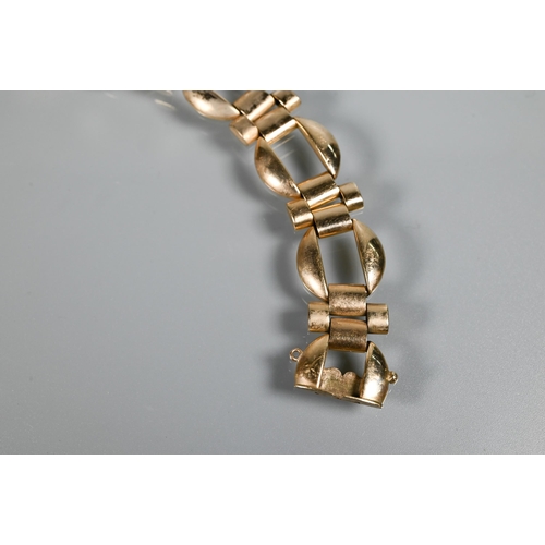 282 - A contemporary 9ct yellow gold bracelet formed of open circle and cross links, concealed clasp, appr... 