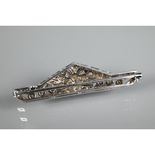 285 - An Art Deco diamond set shaped bar brooch, set overall with graduated millgrain edged round brillian... 