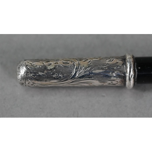 31 - A late Victorian ebonised conductor's baton with engraved silver mounts, Ebenezer Newman & Co, L... 