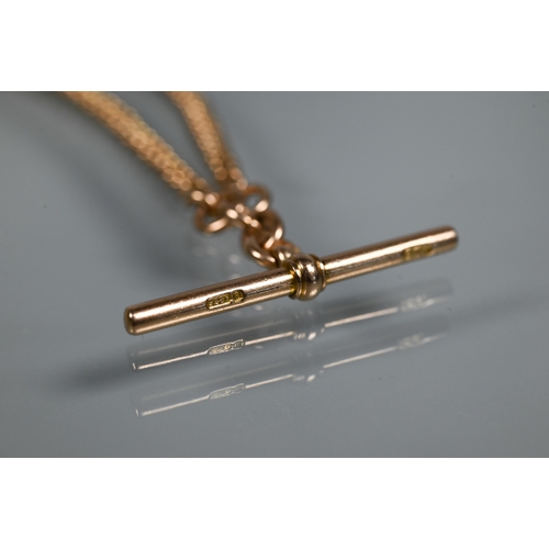 324 - A 9ct rose gold graduated double Albert with bar and two swivels attached, 41 cm long overall, appro... 