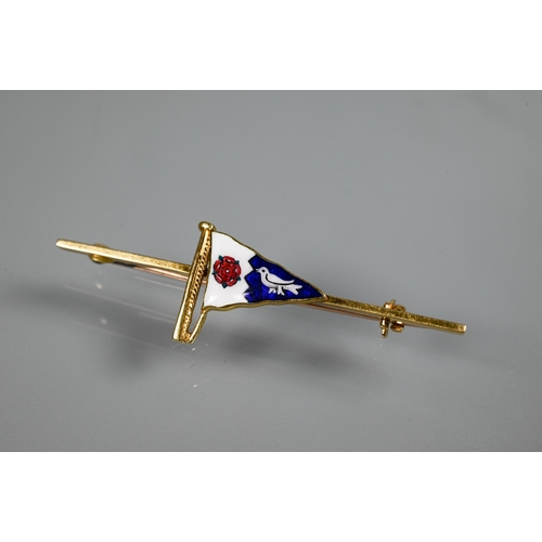 330 - A flag ensign bar brooch, the red, white and blue enamelled flag ensign featuring rosette and bird, ... 