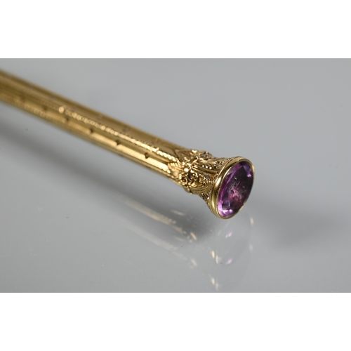 334 - S Mordan & Co - A gilt metal retracting pencil, with purple stone to end engraved with initials,... 