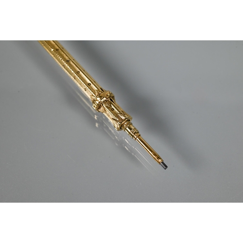 334 - S Mordan & Co - A gilt metal retracting pencil, with purple stone to end engraved with initials,... 