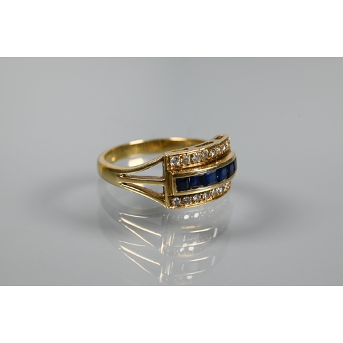 335 - A sapphire and diamond ring, the channel set central row of blue sapphires with row of brilliant cut... 