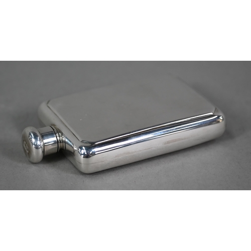 34 - A small silver hip flask with screw-top, Broadway & Co., Birmingham 2005, 3.4oz (apparently unus... 