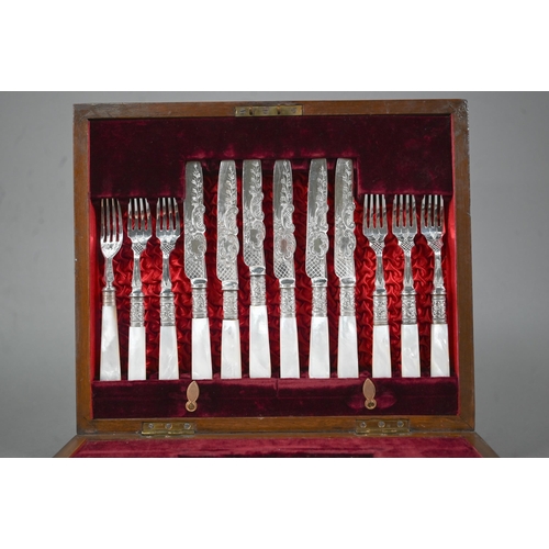 37 - An antique set of twelve electroplated dessert knives and forks with engraved blades and mother of p... 
