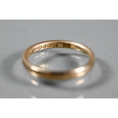 393 - A 9ct yellow gold wedding band, size O, approx 2.5g