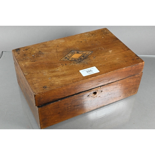 395 - A wooden box containing a quantity of silver items including child's expanding bangle, a double curb... 