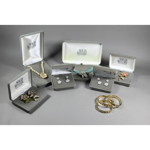 397 - Nolan Miller Glamour Collection - seven boxed items of costume jewellery including bracelets, neckla... 