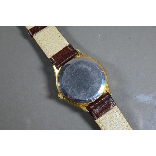 406 - An Omega De Ville (quartz) gents wristwatch, the gilt dial with date aperture within 3 mm dai. case ... 