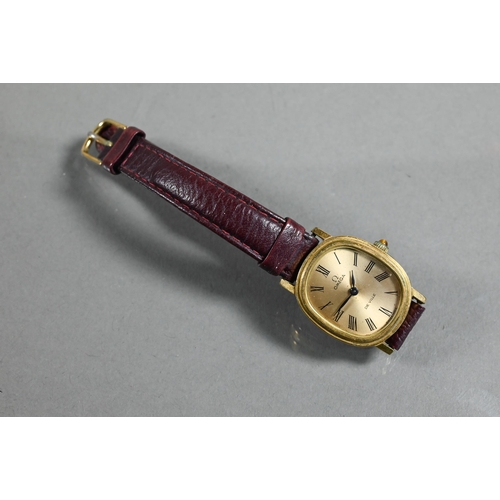 406 - An Omega De Ville (quartz) gents wristwatch, the gilt dial with date aperture within 3 mm dai. case ... 