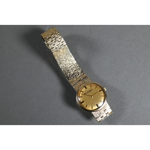 407 - Bueche-Girod, a 9ct gold ladies wristwatch, 22 mm dia, on textured bracelet - 31.6 g all-in