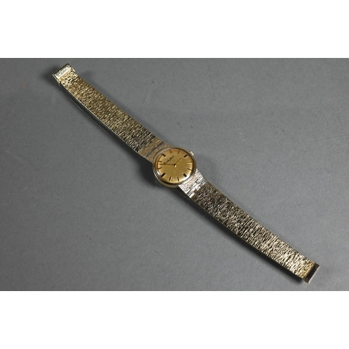 407 - Bueche-Girod, a 9ct gold ladies wristwatch, 22 mm dia, on textured bracelet - 31.6 g all-in