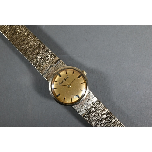 407 - Bueche-Girod, a 9ct gold ladies wristwatch, 22 mm dia, on textured bracelet - 31.6 g all-in