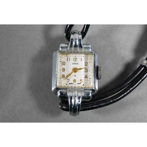 408 - A vintage Oris lady's cocktail wristwatch, the square dial within a steel 17 mm case, on leather str... 