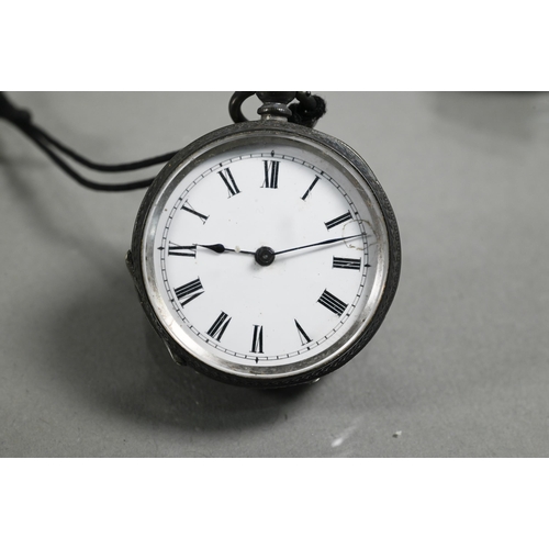 411 - A small steel cased fob watch, the white enamelled dial with roman numerals with subsidiary seconds,... 