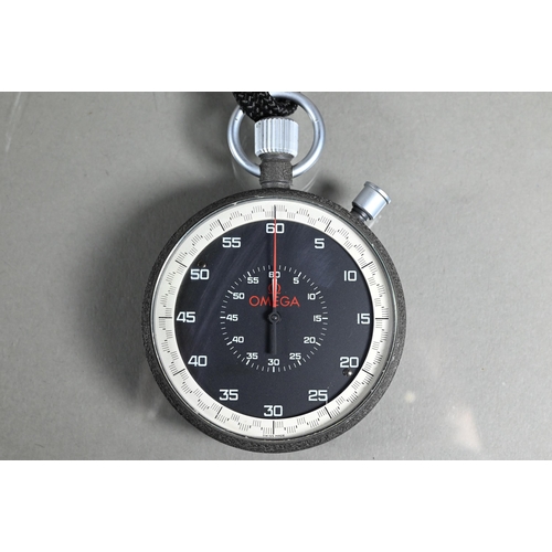 412 - A contemporary Omega stopwatch, 63 mm dia, on braided cord neck strap