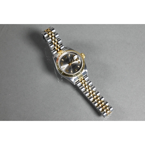 413 - A Rolex lady's Oyster Perpetual Datejust wristwatch, Y392427, in fitted case with all papers, spare ... 