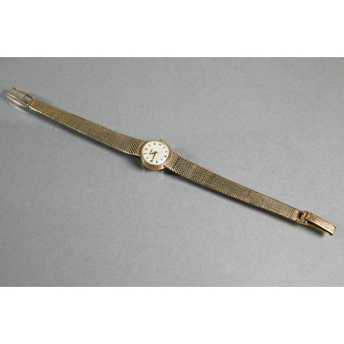 417 - A ladies Longines 9ct gold cased wristwatch, the champagne dial with Arabic quarter hour numerals in... 