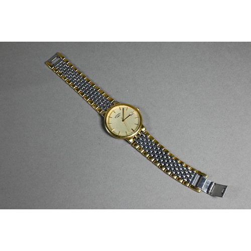 419 - A Rotary gents gold plated and stainless steel wristwatch, with extra links, and box