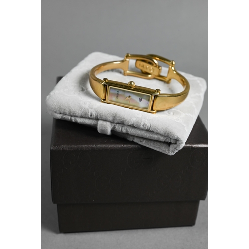 426 - AMMENDMENT - Fashion watches - a Gucci gilt metal ladies bracelet watch with mother of pearl dial, b... 